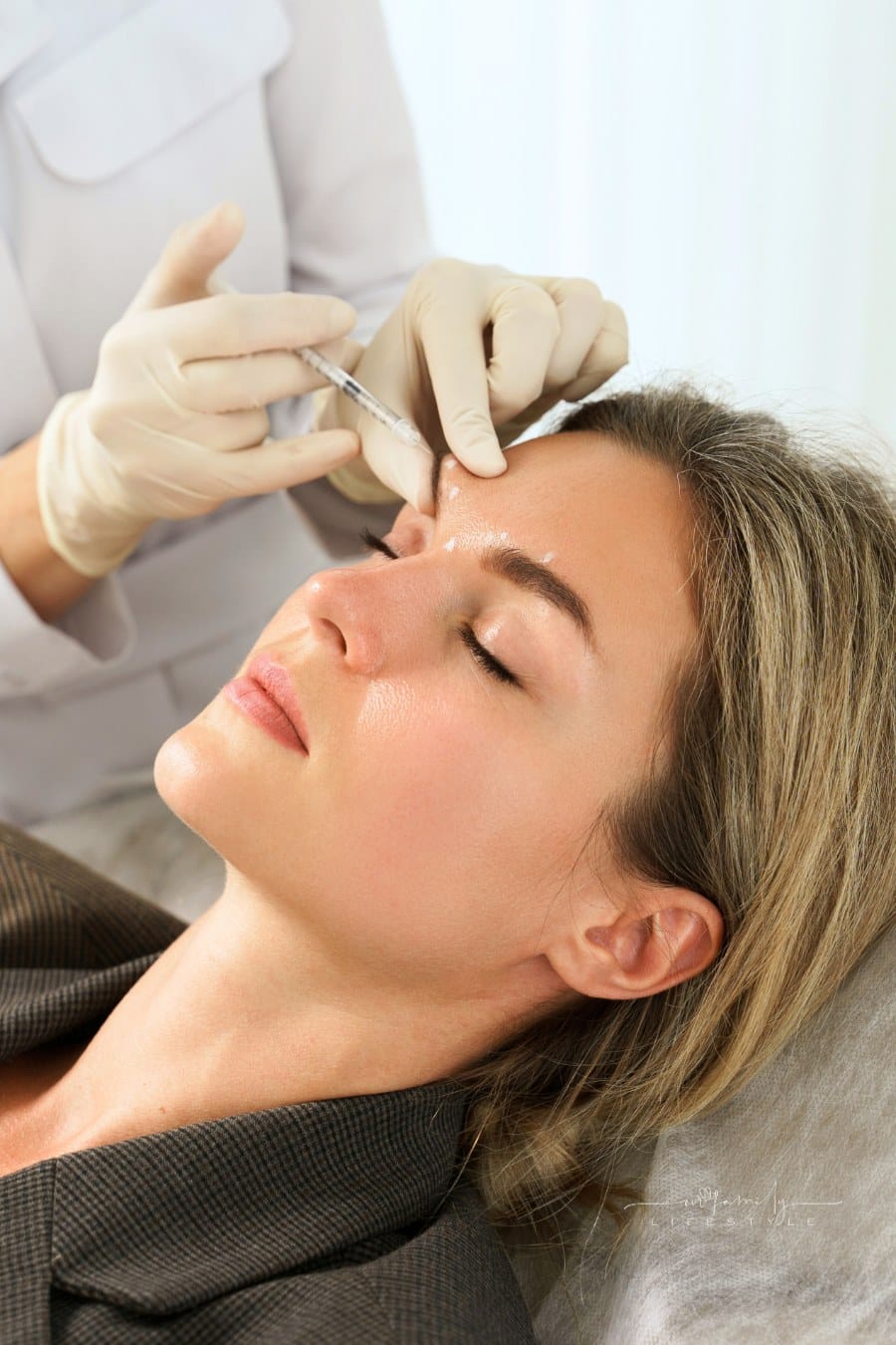 Doctor Making Marks on Client's Face before Filler Injection