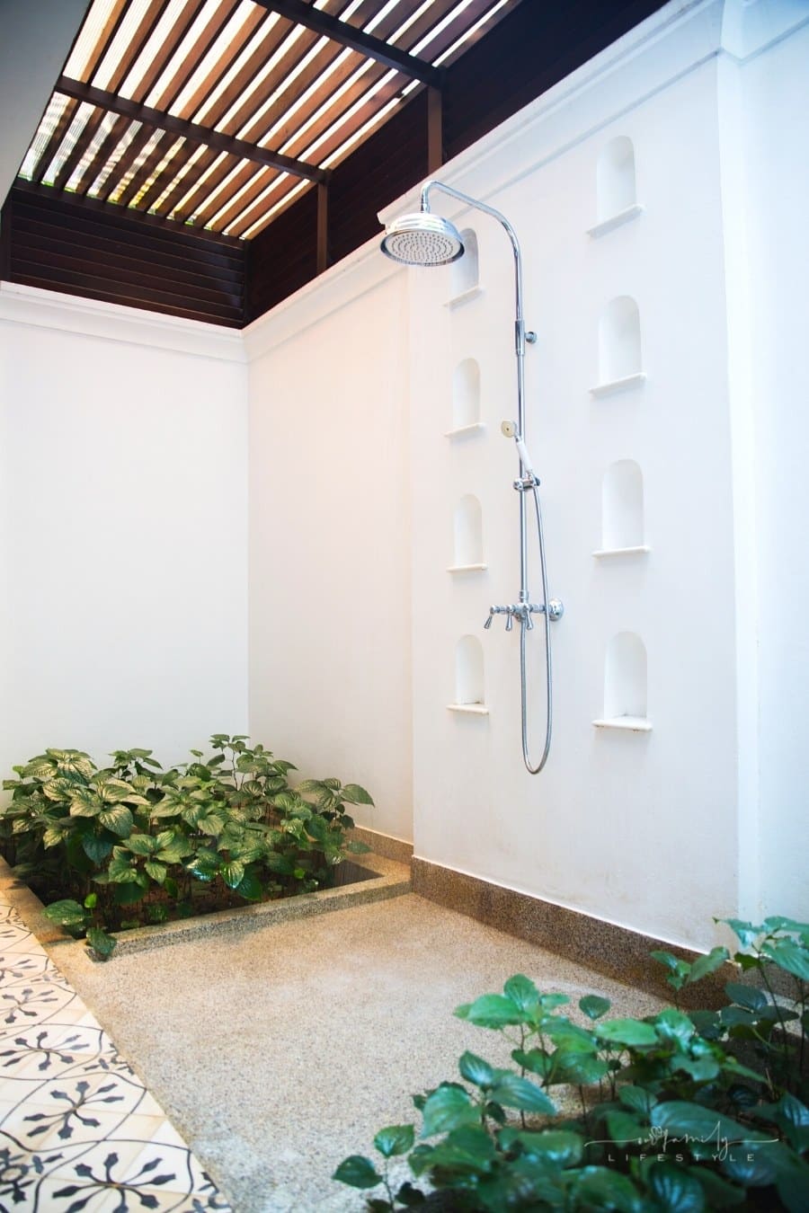 outdoor shower with overhead slatted roof