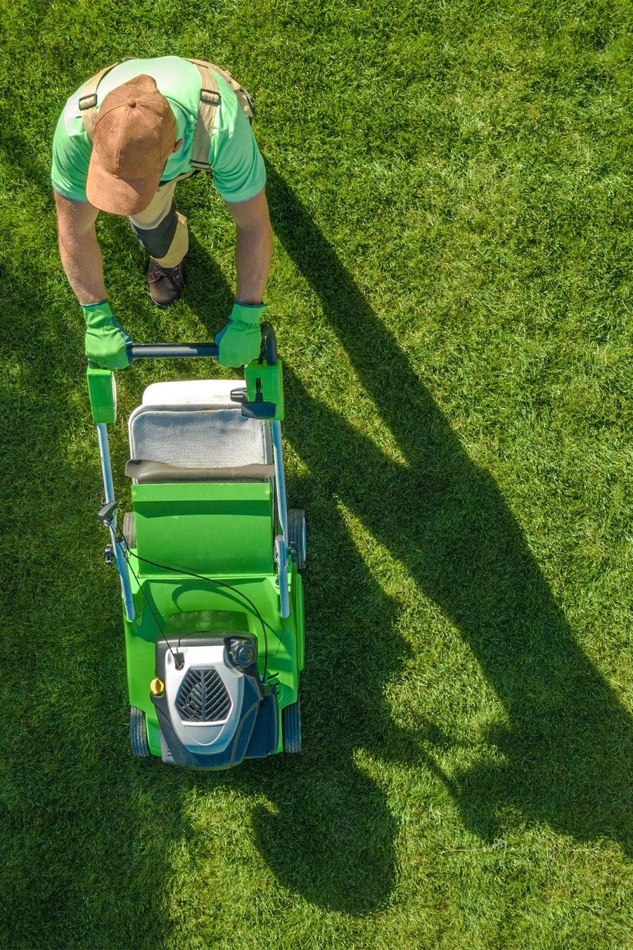 Professional Landscaper mowing yard