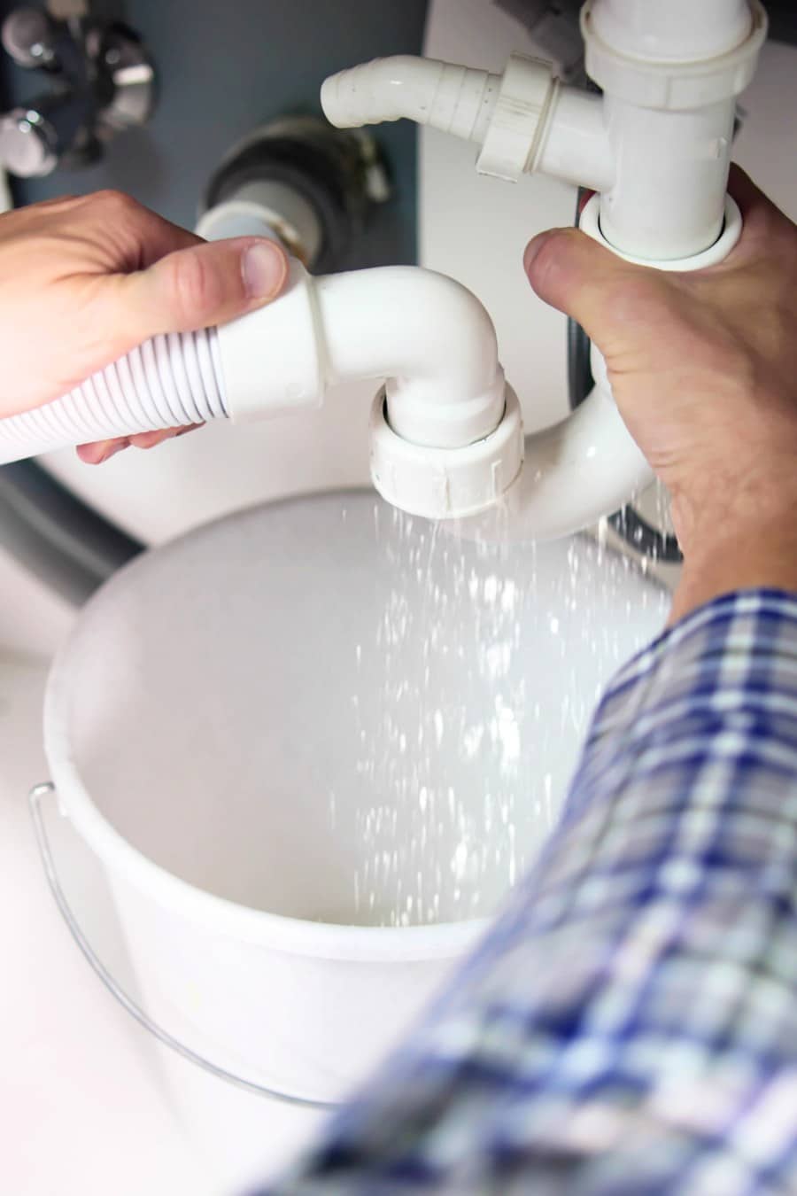 Plumber Fixing Pipe Leak