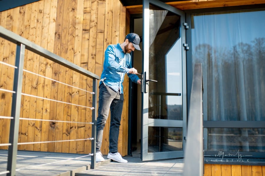 Man Repairing Door Lock