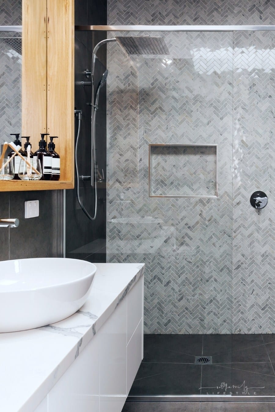 mosaic herringbone tiled shower feature wall