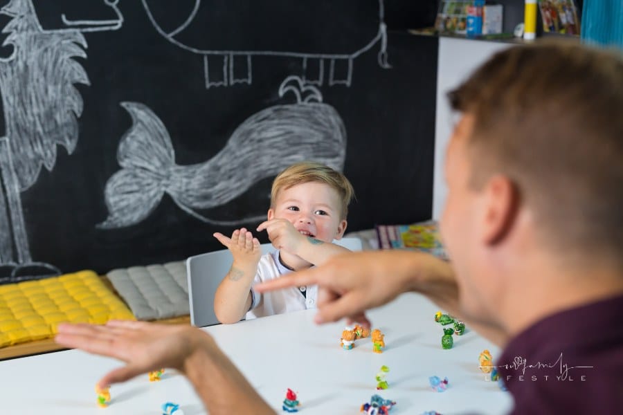 Cute little playful toddler boy at child therapy session. Private one on one homeschooling with didactic aids.