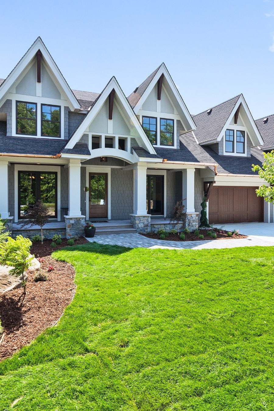 Craftsman home with immaculate landscaping