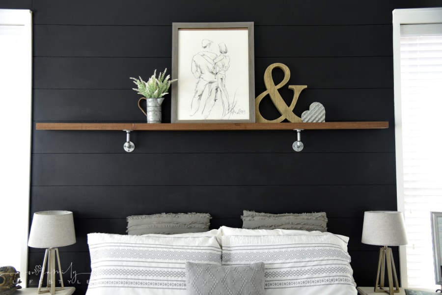 black shiplap wall with shelf master bedroom