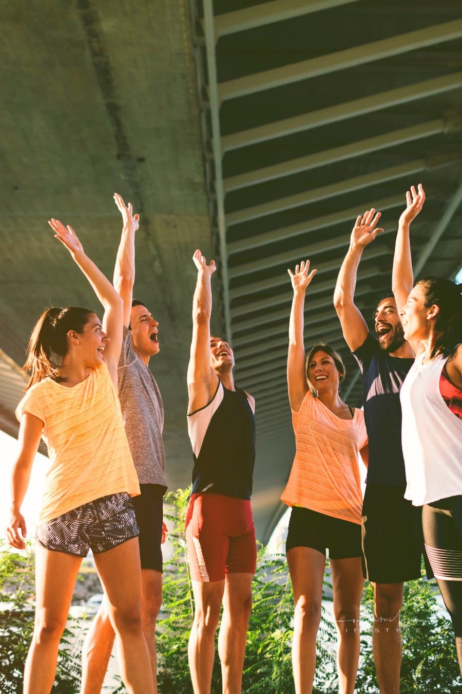 Running Team Joining Hands.
