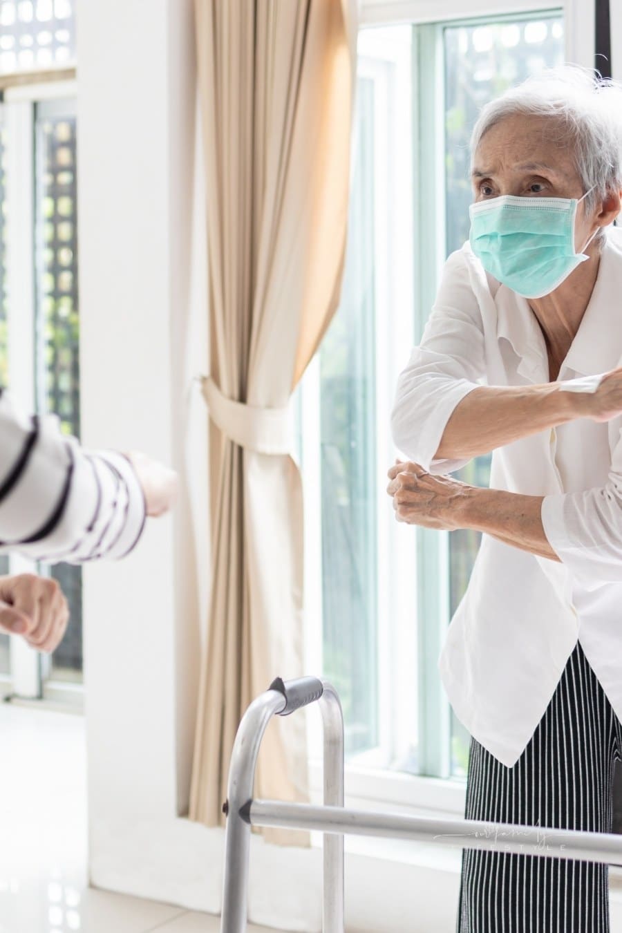 Asian woman is doing exercise activities for the elderly