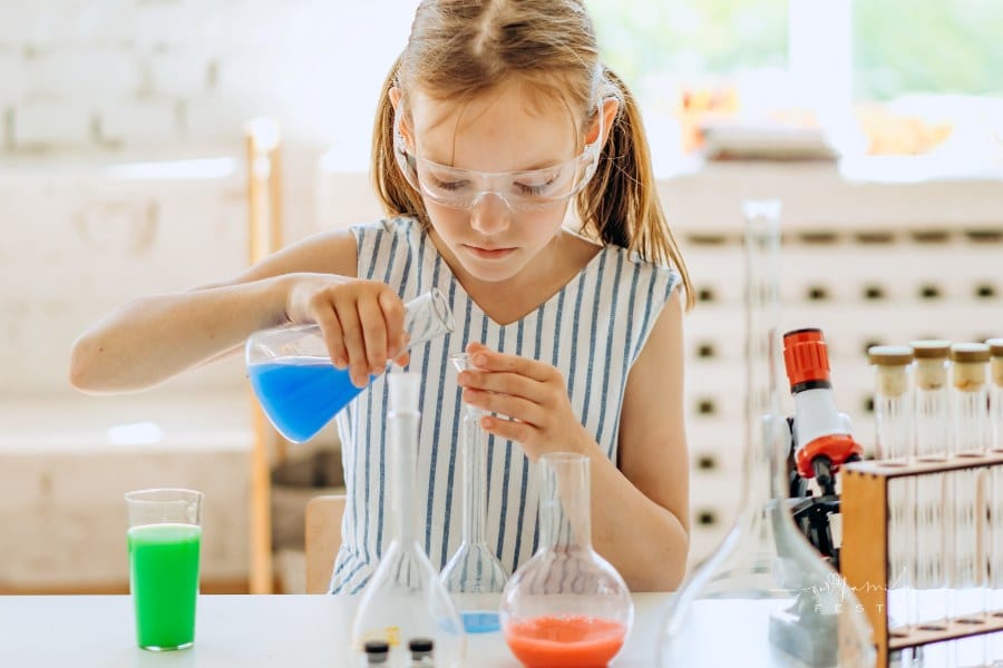 A Girl Doing a Science Experiment