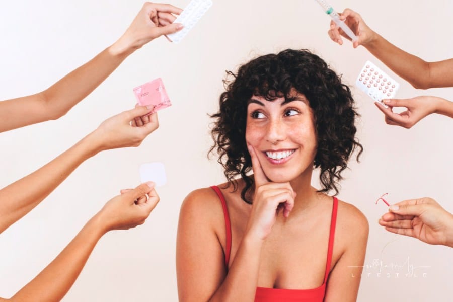 woman thinking about birth control options shown by hands all around her