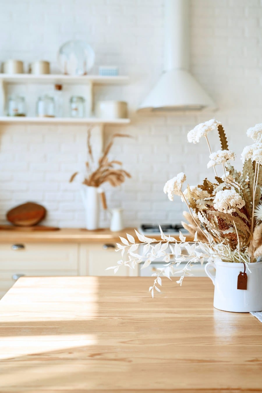Kitchen wooden table top and kitchen blur background interior style scandinavian