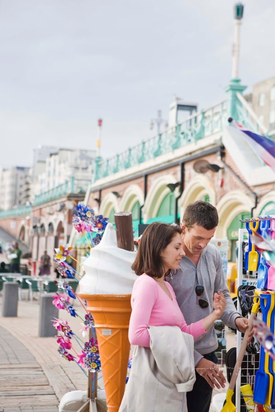 Couple shopping for souvenirs, Brighton, England