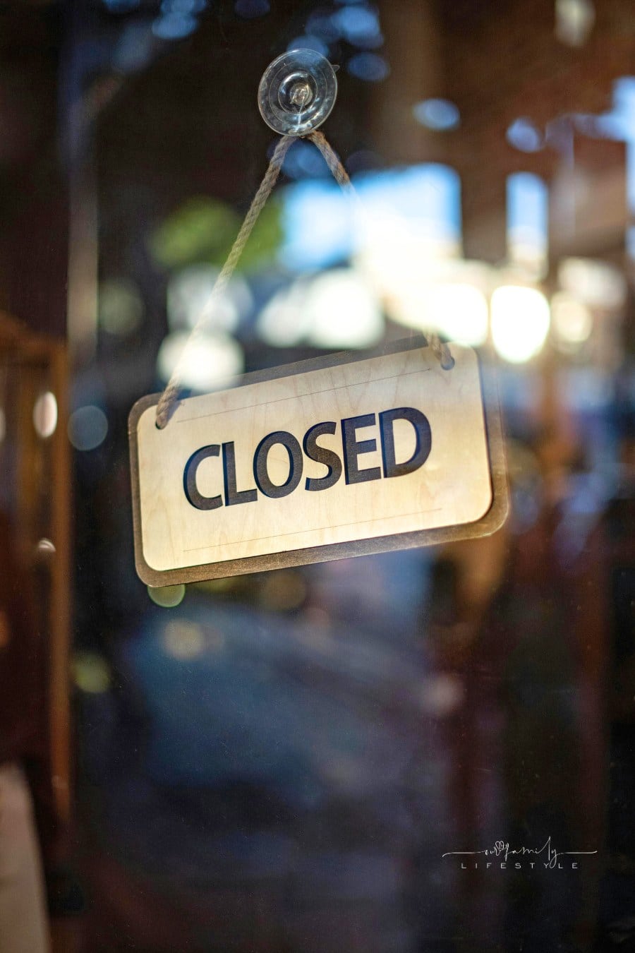 Closed Sign on a Restaurant Window
