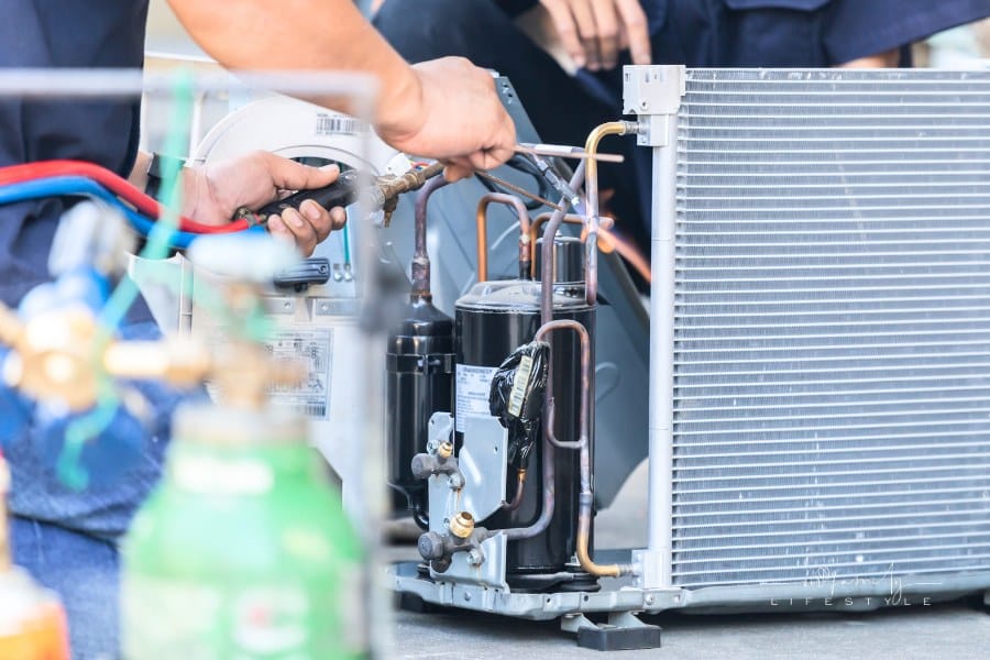 Close up of Air Conditioning Repair Team Use Fuel Gases