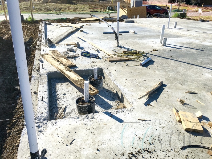 pouring the concrete for house foundation