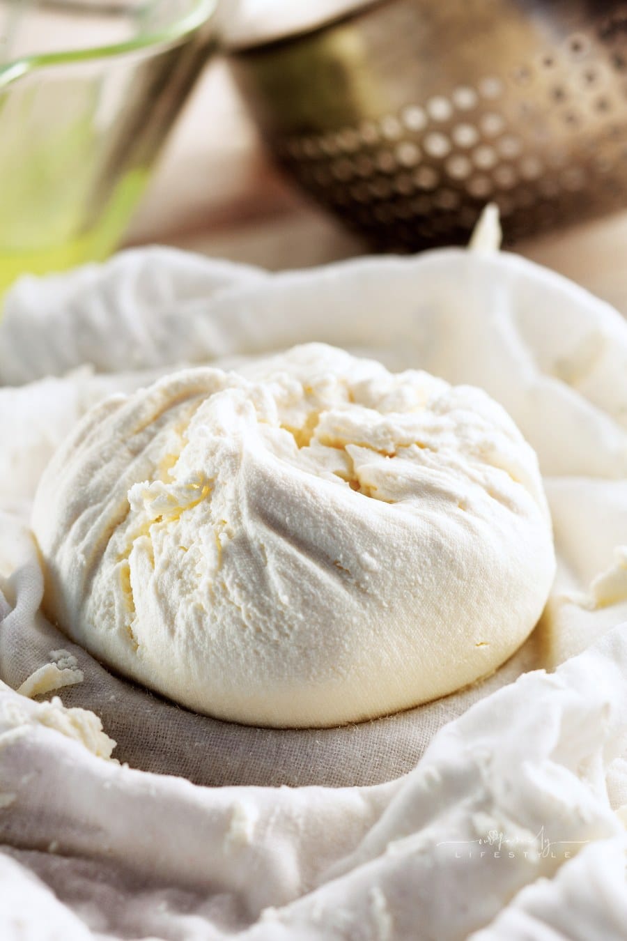 Homemade cheese in cheesecloth ,Fresh ricotta,whey cheese,Cheese Making,Process of making cheese