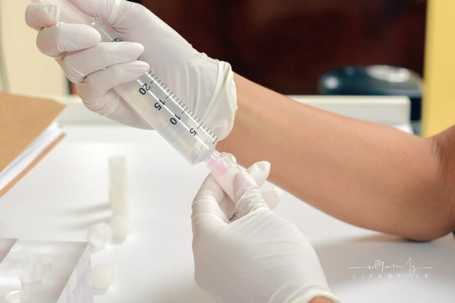 Nurse Drawing Up Stem Cells into Syringe