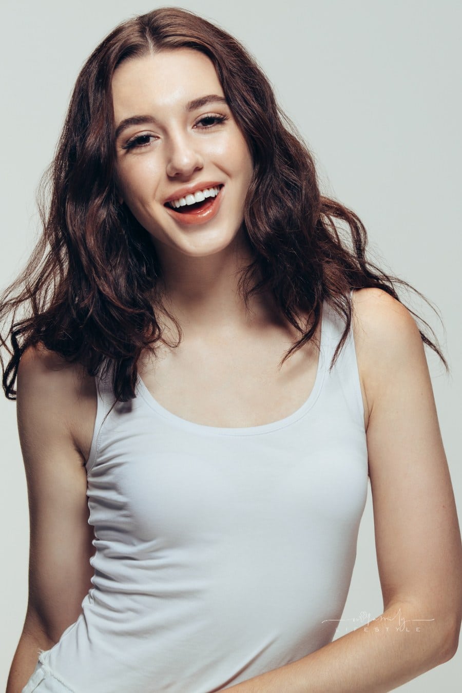 Confident Woman smiling in Casuals