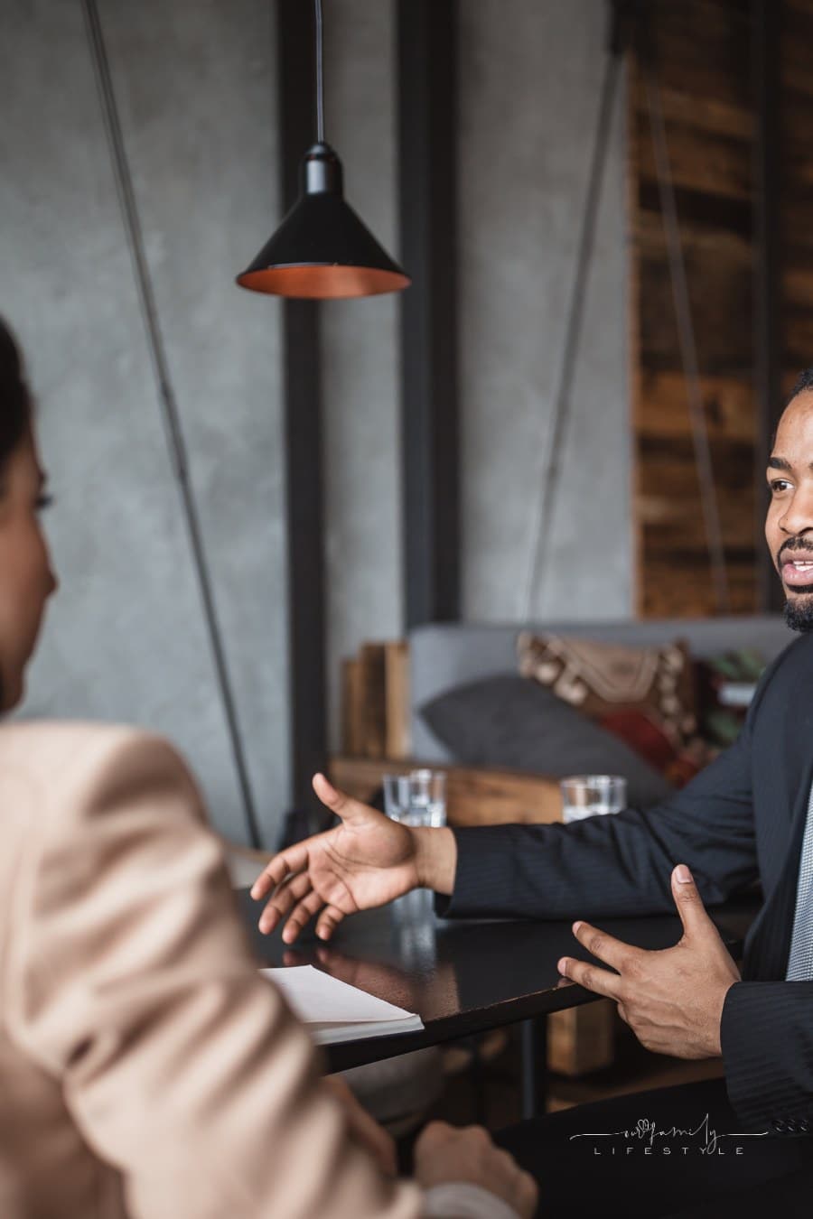 man talking to businesswoman during a job interview