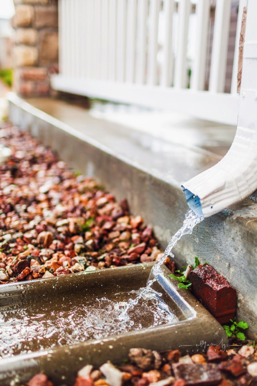 Water Draining From Gutter