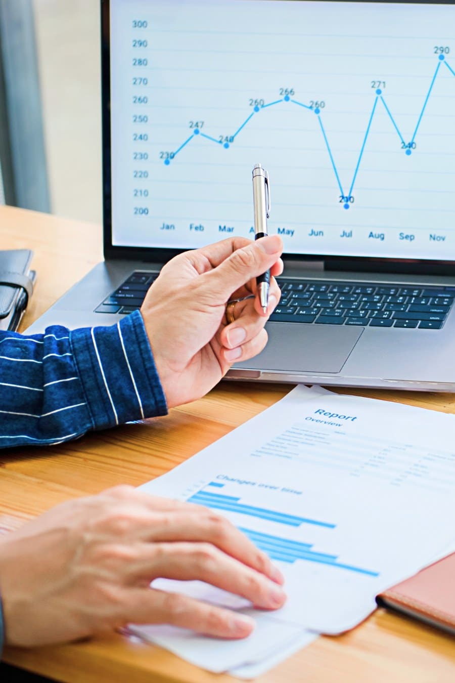 financial advisor going over number graphs