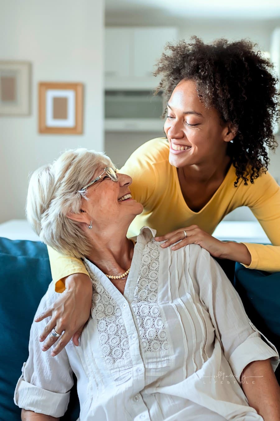 Smiling elderly woman and her daughter