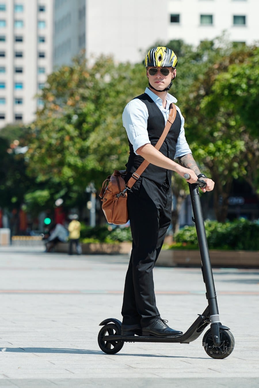 Stylish Man Riding on Electric Scooter