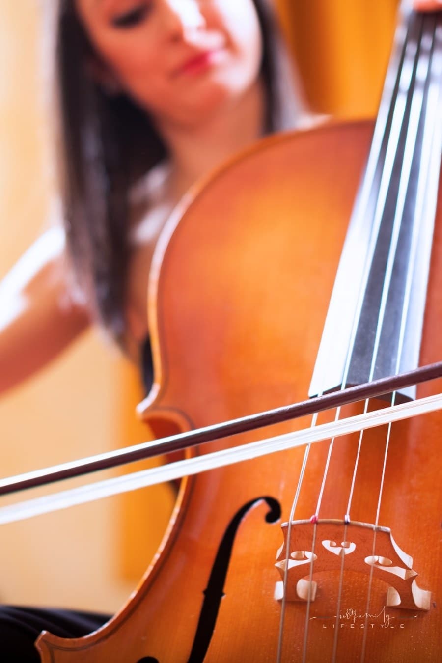 woman playing cello