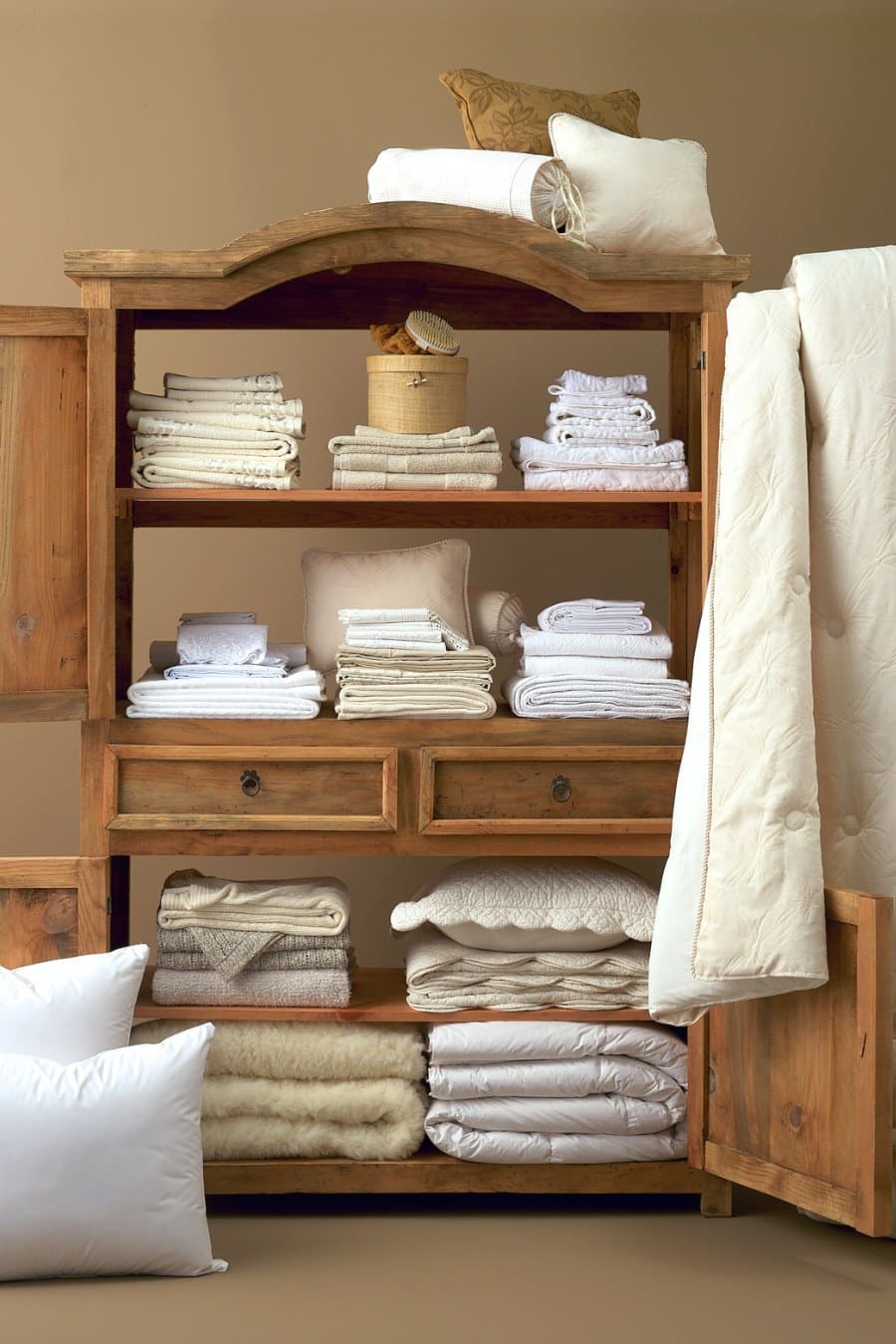 Armoire filled with linens