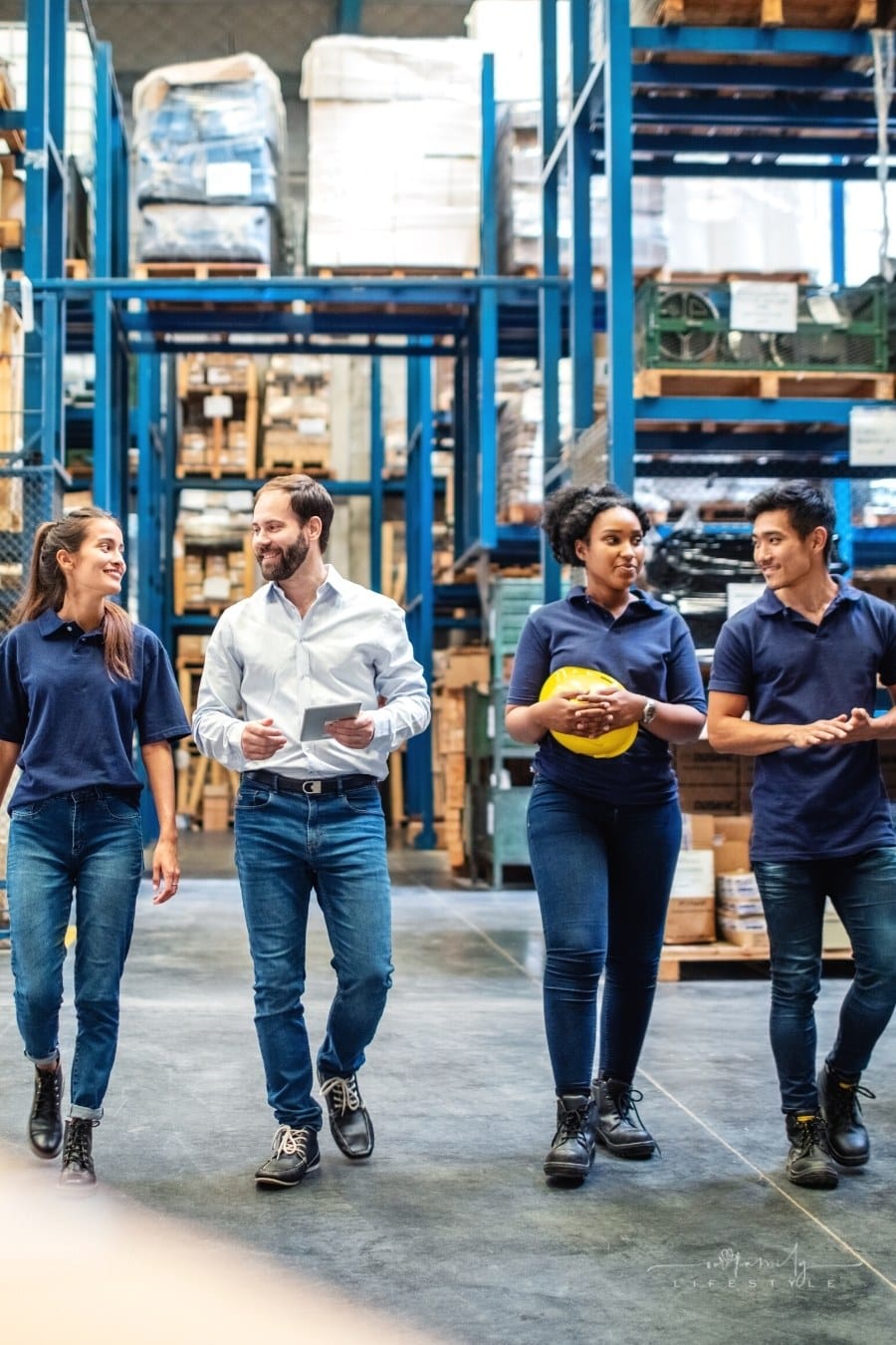 warehouse workers walking and talking