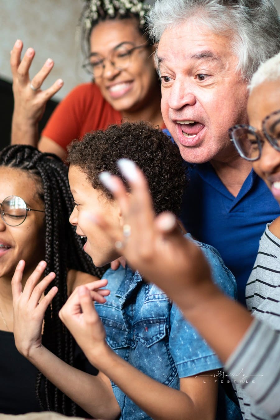 family and friends laughing while playing games