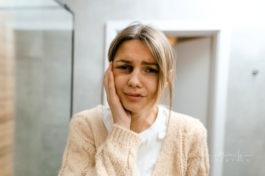 Close-Up Shot of a Sad Woman with cuts and bruises from domestic violence