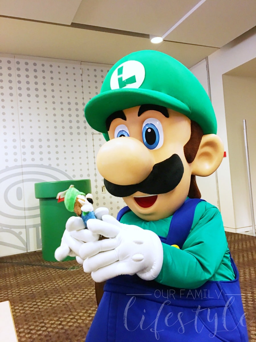Luigi with a stuffed Luigi