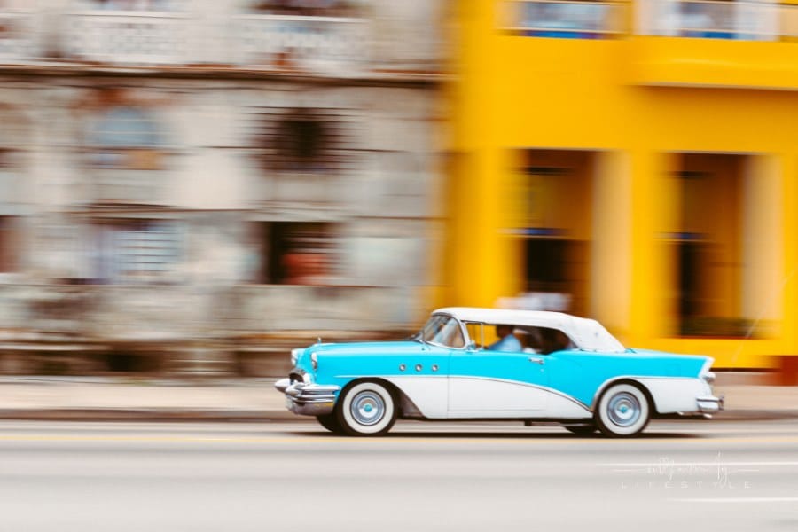 50's Classic Car going down a street in Havana Cuba