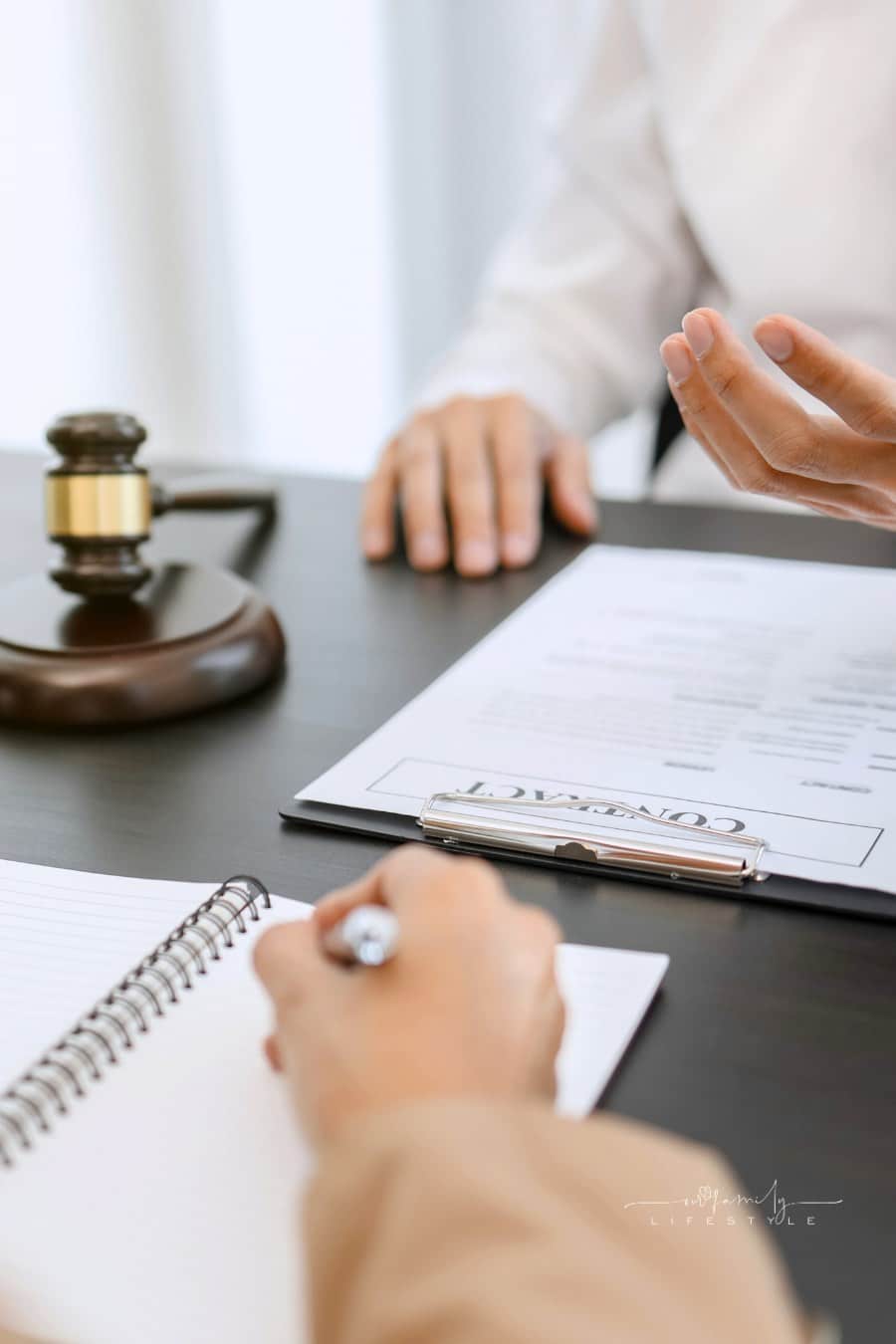 lawyer consulting with client discussing about contract