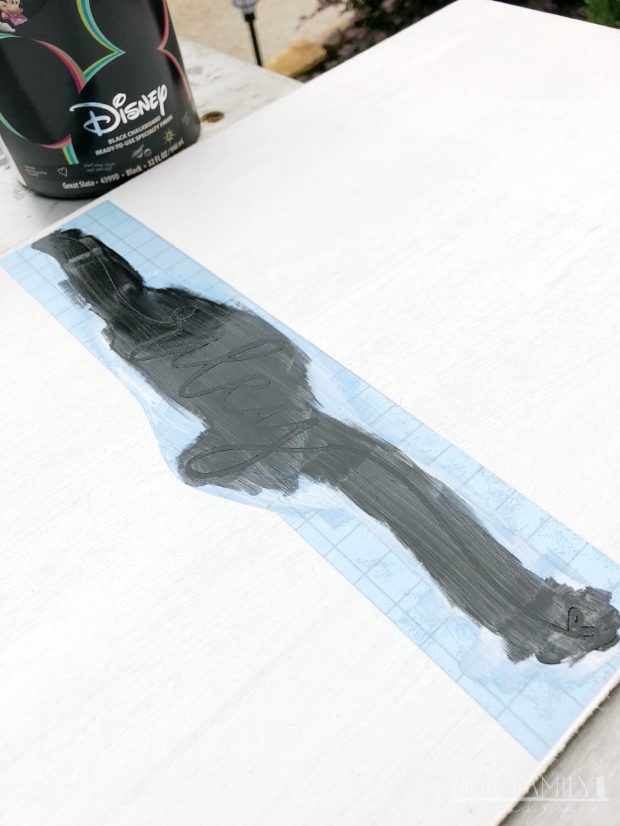 painting Cricut stencil vinyl on wooden sign