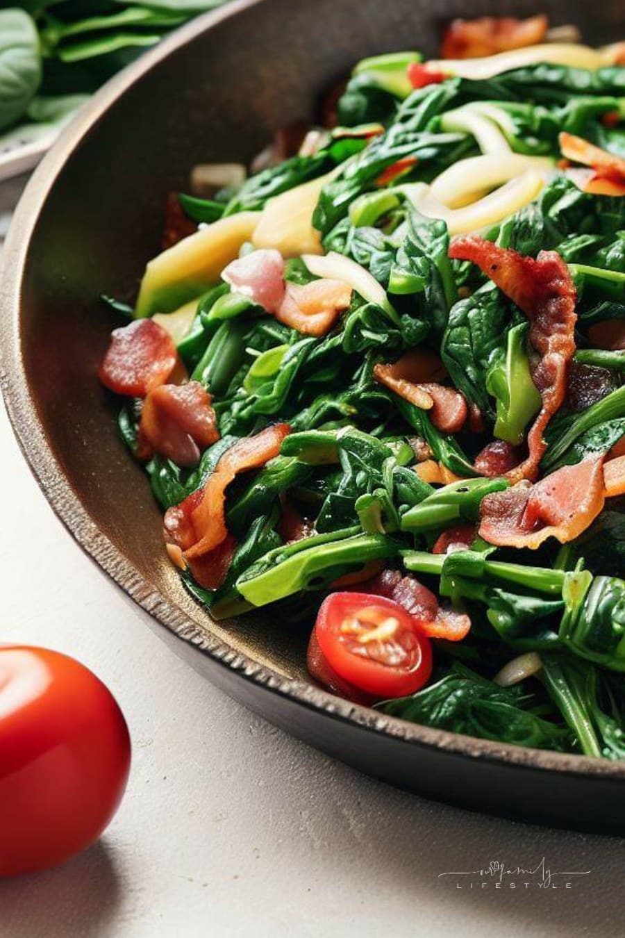 greens, tomatoes, onions, and bacon for poke salad