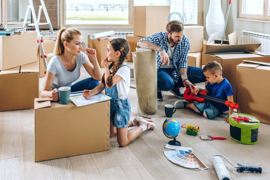 young family packing to move into new house