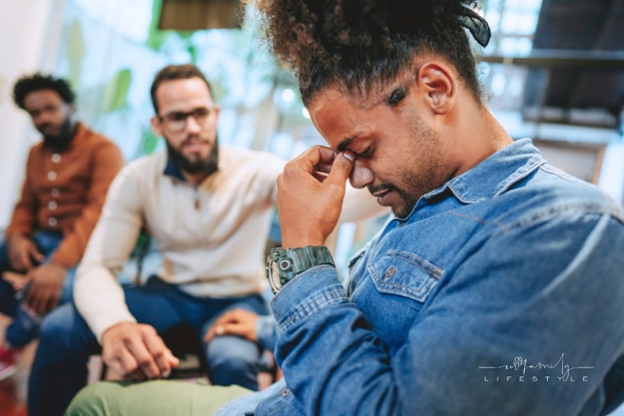 Sad person emotional support group