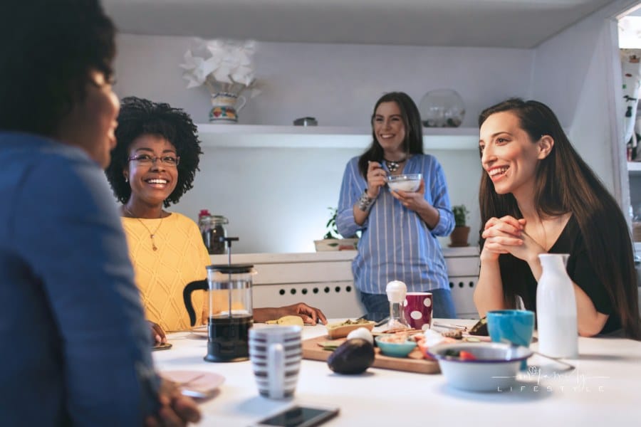 Female Roommates Having Breakfast Together