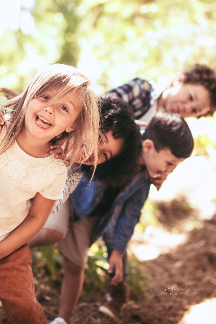 Diverse Group of Kids Playing Hide and Seek in a Park