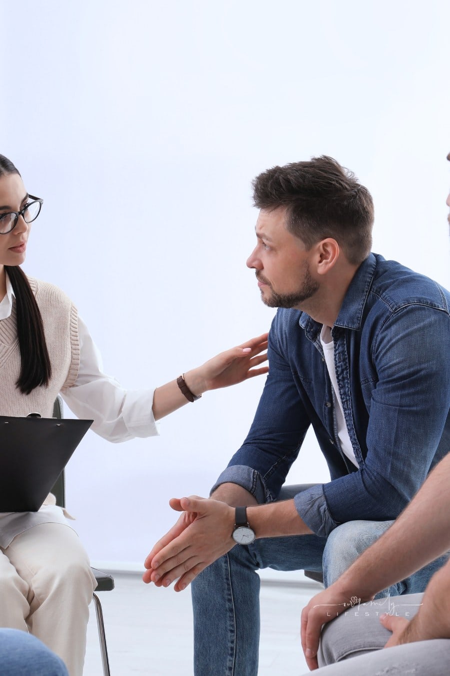 Psychotherapist Working with Group of Drug Addicted People at Rehab