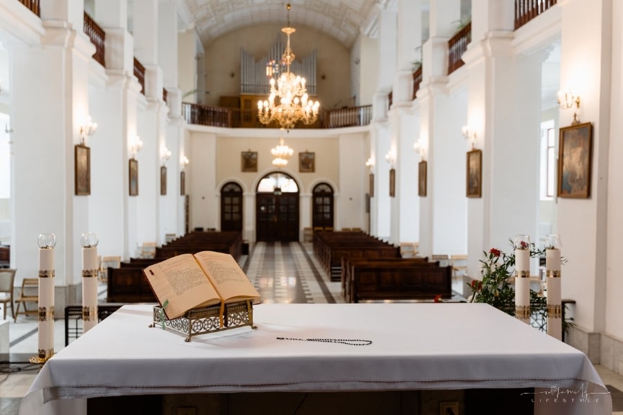 white and brown interior of a church building