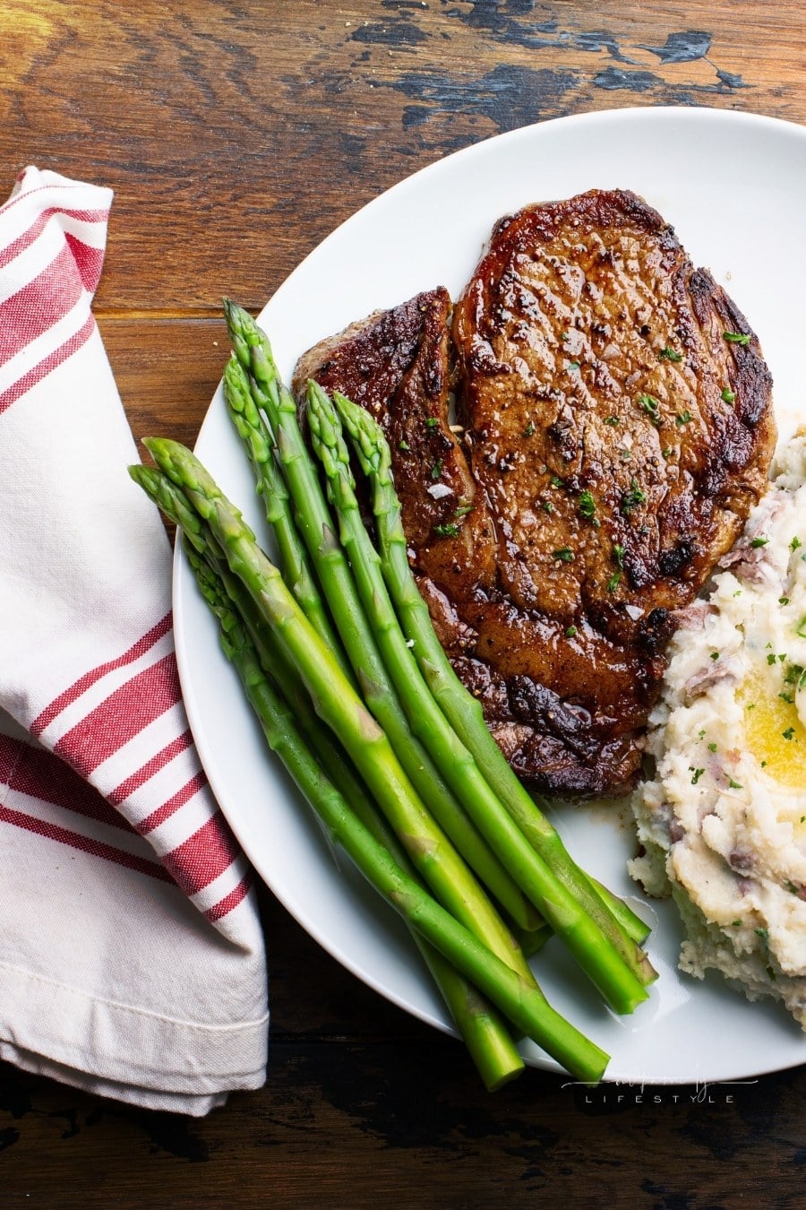 air fryer steak with mashed potatoes and asparagus