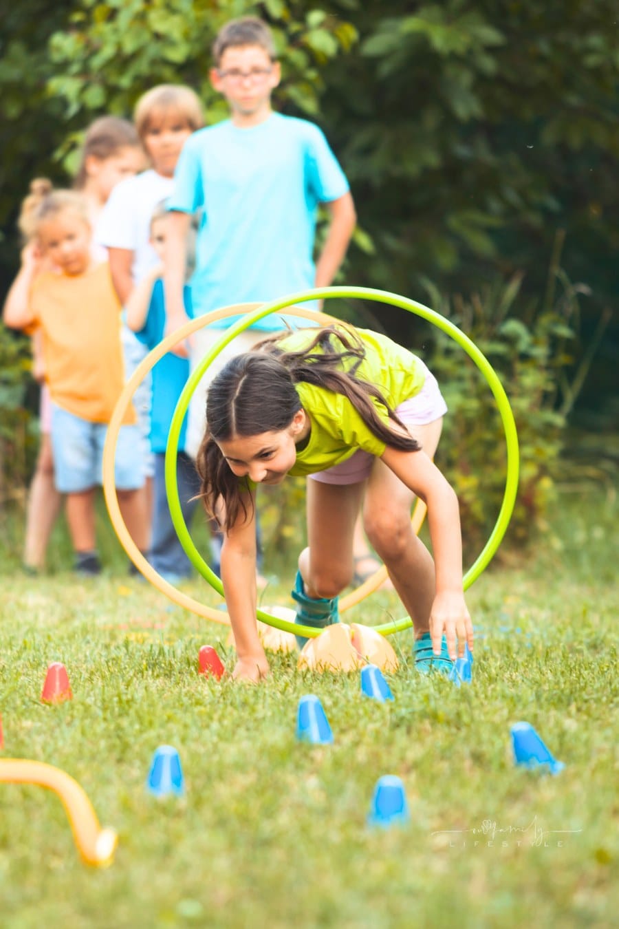 kids at summer camp participating in field day games