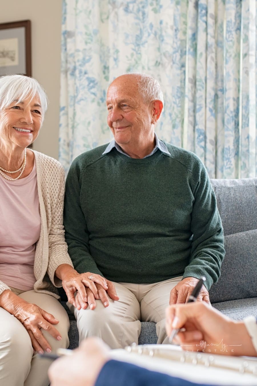 Social Worker Talking to Senior Couple at Home