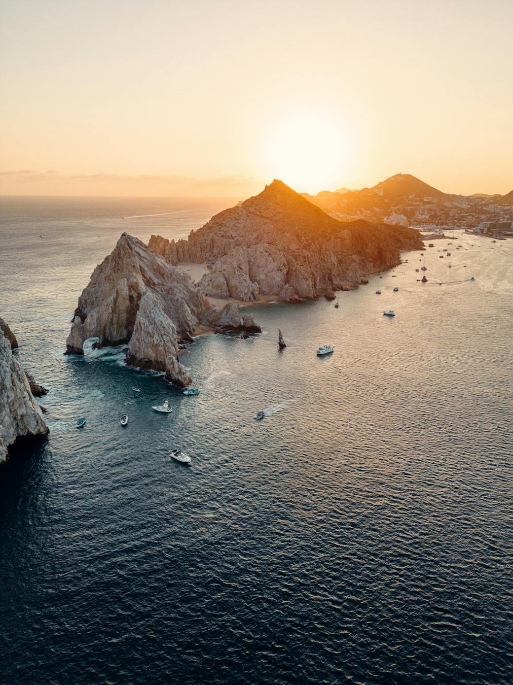 Stunning aerial view of sunrise at Land's End, Cabo San Lucas, México.