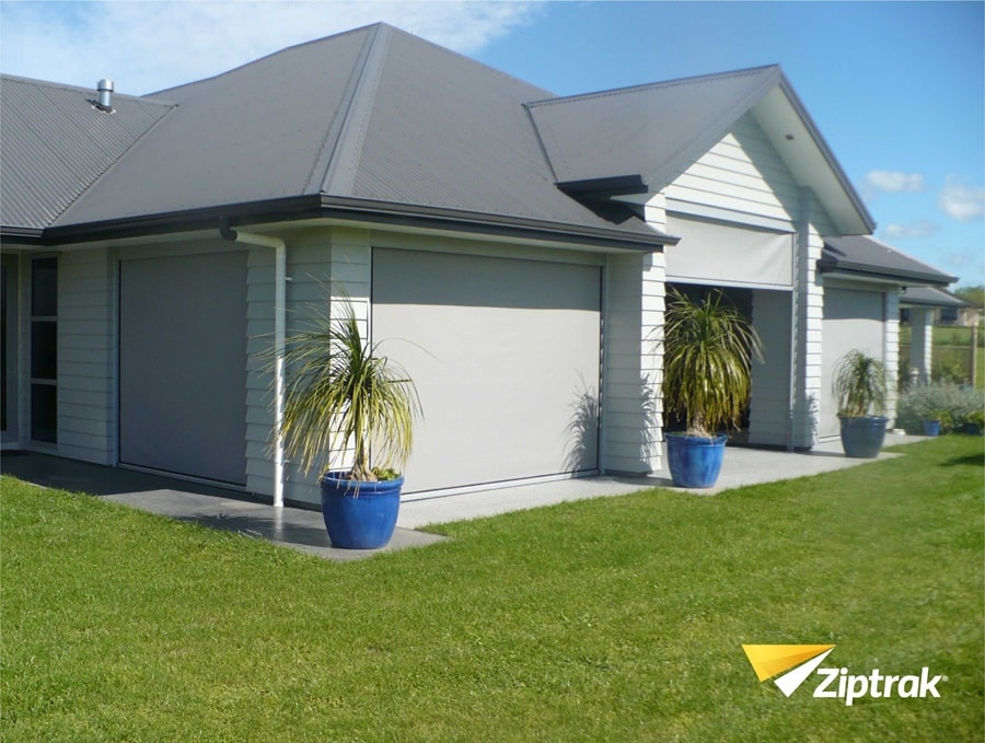 exterior roller blinds on house window