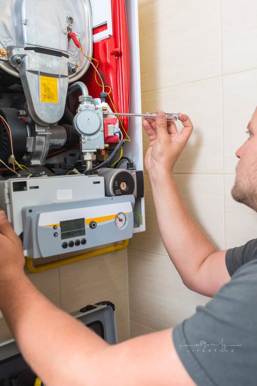 Technician repairing Gas Furnace