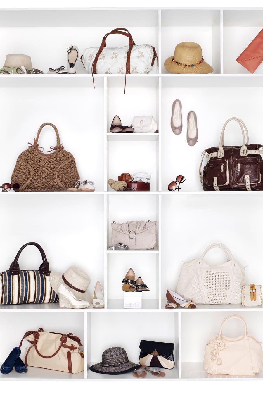 white shelves filled with women's fashion accessories