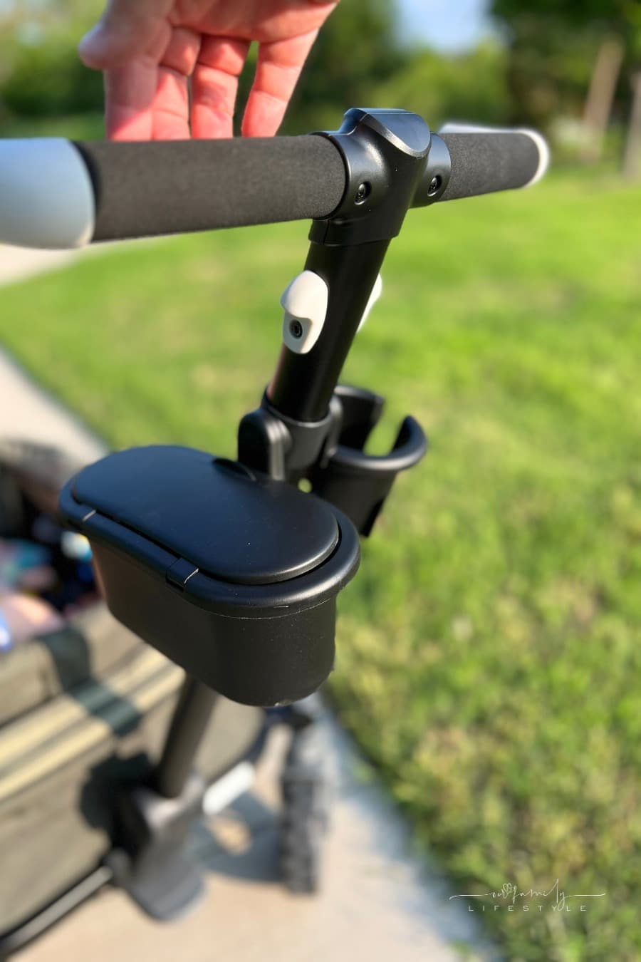 parent cupholder and staorage compartment on Anthem All-Terrain Wagon Stroller